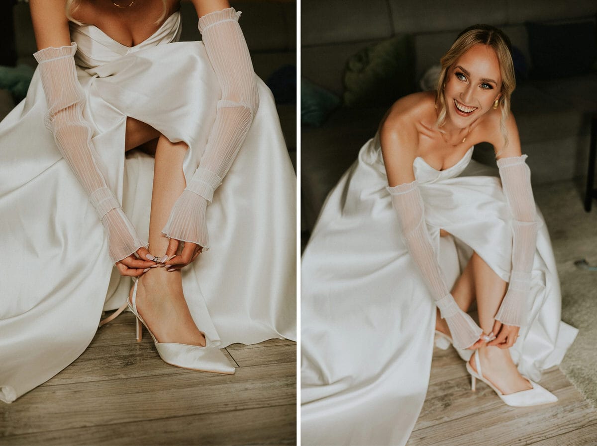 Panna młoda zapina buty w sukni ślubnej